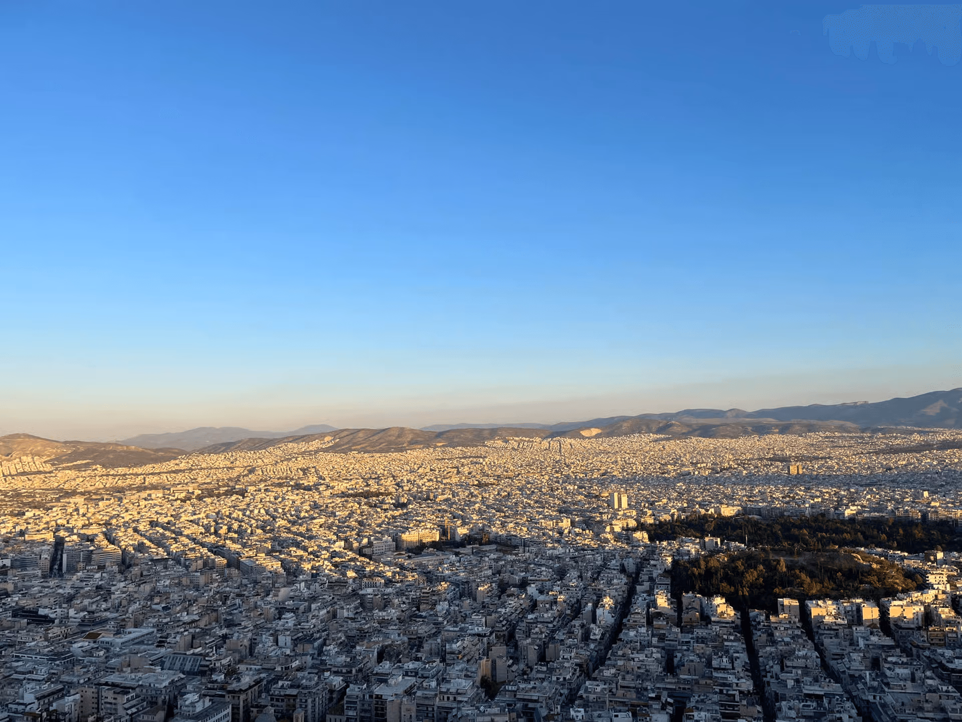 Parthenon and Acropolis viewed from the Athens hills showing the difference between the two structures